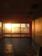 Meridian studios, Sunset through a graffitid window.jpg